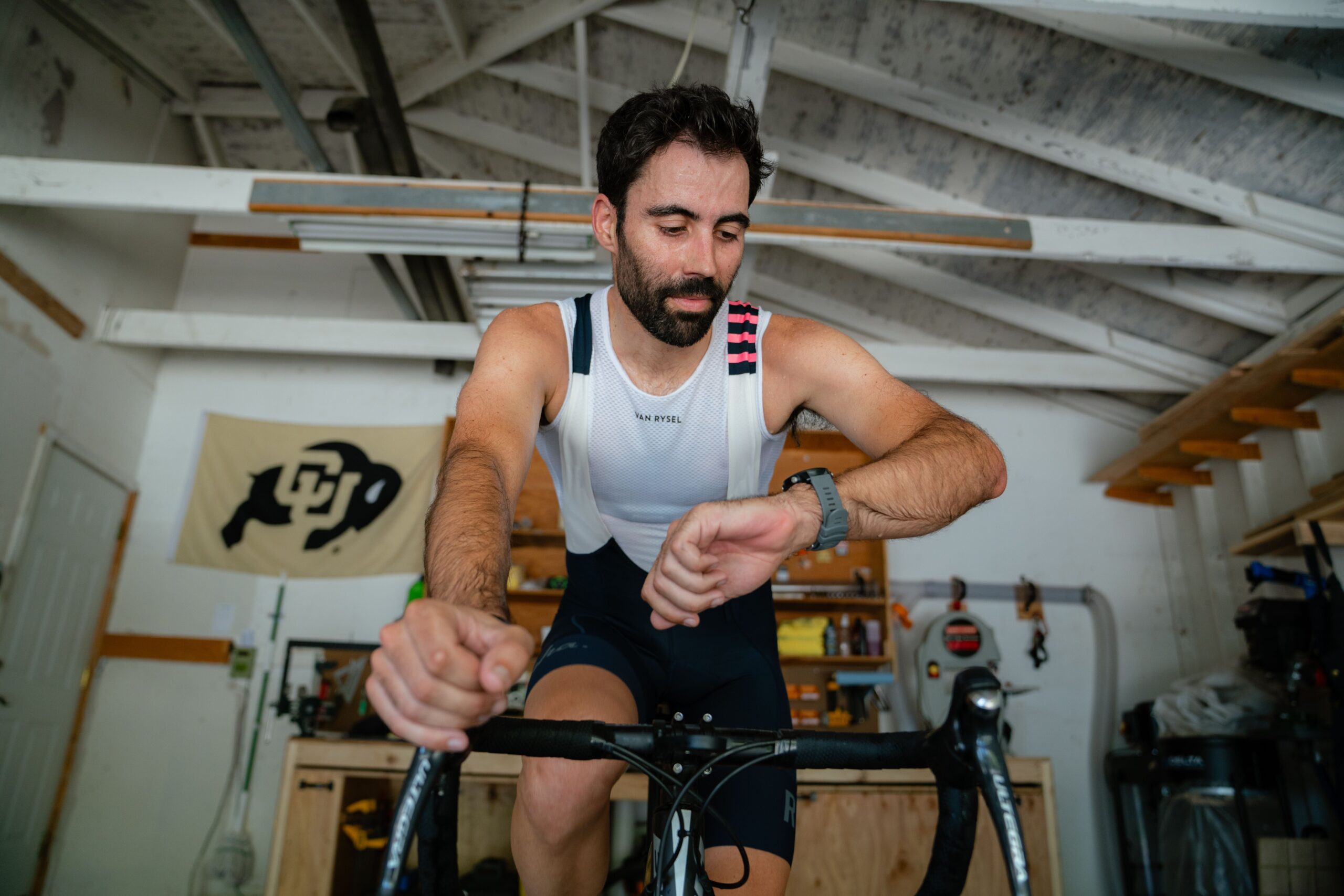 Male Cyclist On Indoor Training Doing 60 Minute Cycling Workout Indoors
