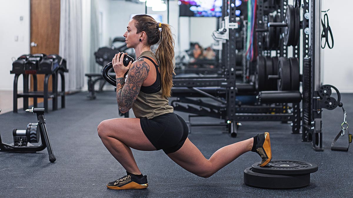 Female Strength Training Athlete Performing Bulgarian Split Squat